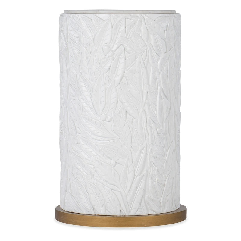 Mesa decorativa redonda con cubierta de cuarzo y base con patrón de hojas