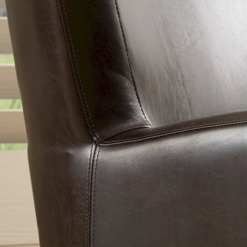 Sillón giratorio estilo club con respaldo alado de cuero regenerado