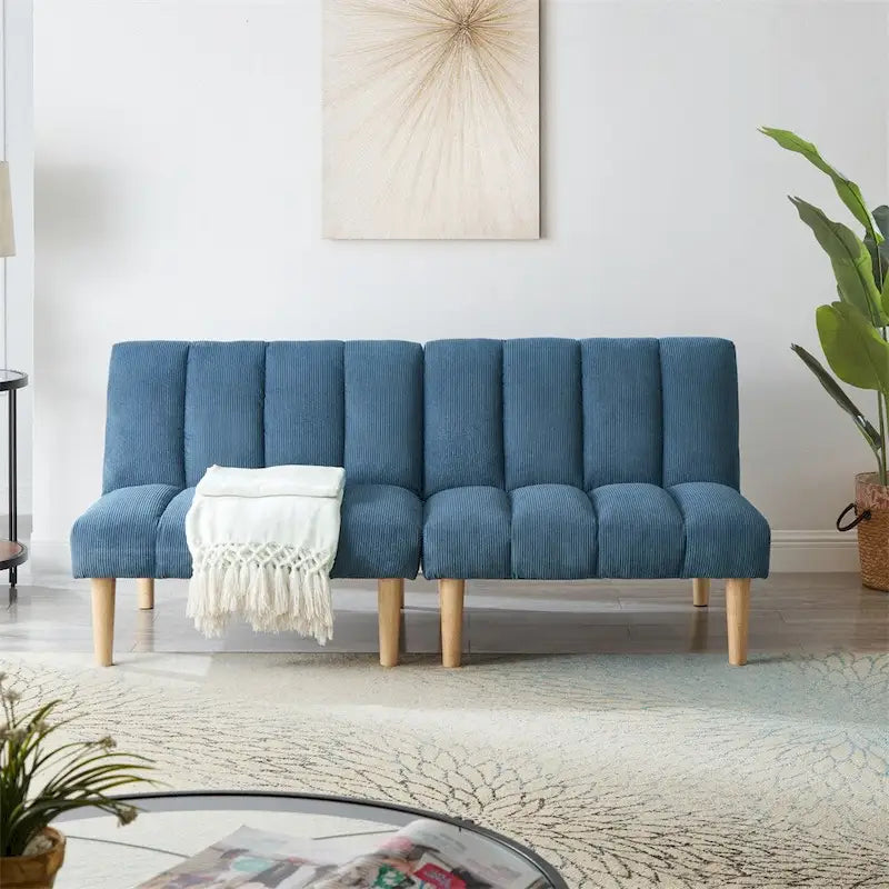 Sofá cama convertible de pana con patas de madera